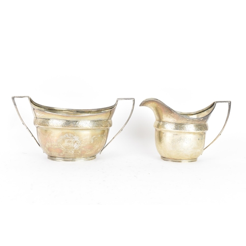 255 - A George III silver cream jug and matching sugar bowl, by John Emes, hallmarked London 1804, each ha... 