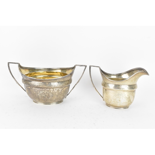 255 - A George III silver cream jug and matching sugar bowl, by John Emes, hallmarked London 1804, each ha... 