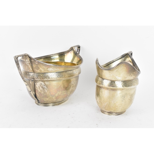 255 - A George III silver cream jug and matching sugar bowl, by John Emes, hallmarked London 1804, each ha... 