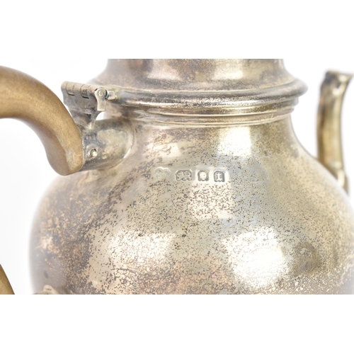 256 - A George V silver teapot, by Goldsmiths & Silversmiths Co Ltd, hallmarked London 1934, of baluster f... 