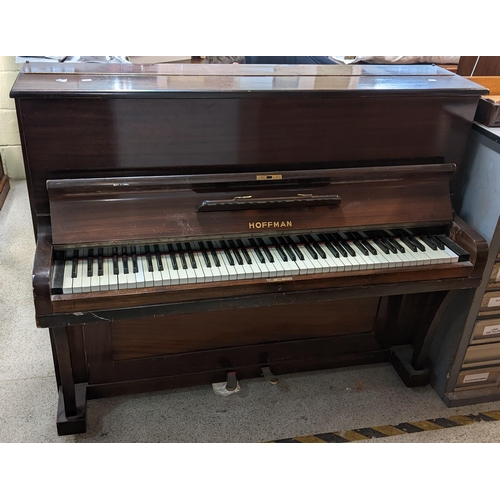 489 - A Hoffman mahogany upright piano, 113.5cm h x 137cm w
Location:FOYER
If there is no condition report... 