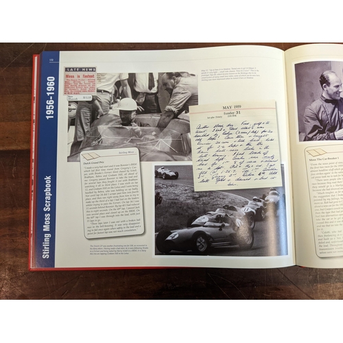 426 - A Stirling Moss signed scrapbook 1956-1960 by Stirling Moss & Phillip Porter in a protective red sle... 