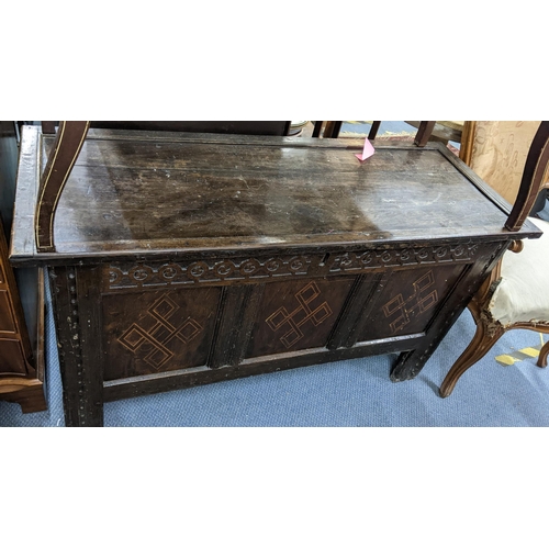 464 - A late 17th/early 18th century oak coffer having inlaid and carved front panels 68H x 122W
Location:... 