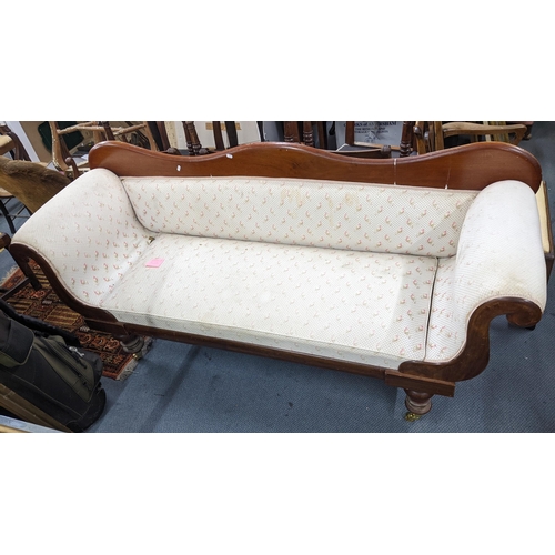 254 - A Victorian mahogany sofa having scroll formed arms and on castors, 89.5H x 200W
Location: A3M
If th... 