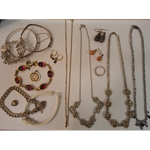 411 - A quantity of costume jewellery and a contemporary ladies Newbridge silver tone watch to include a p... 