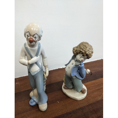 458 - Six porcelain figures to include Nao by Lladro 'Travelin' Man', three Casades clown figures, a Nao b... 