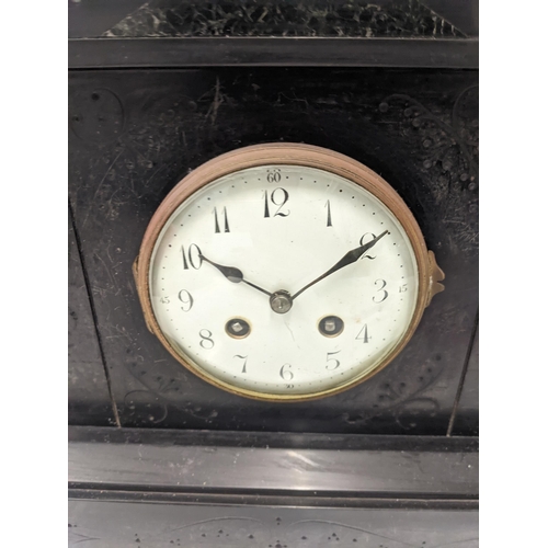 459 - A Victorian slate mantel clock with architectural design, with an Arabic dial
Location: LAB
If there... 