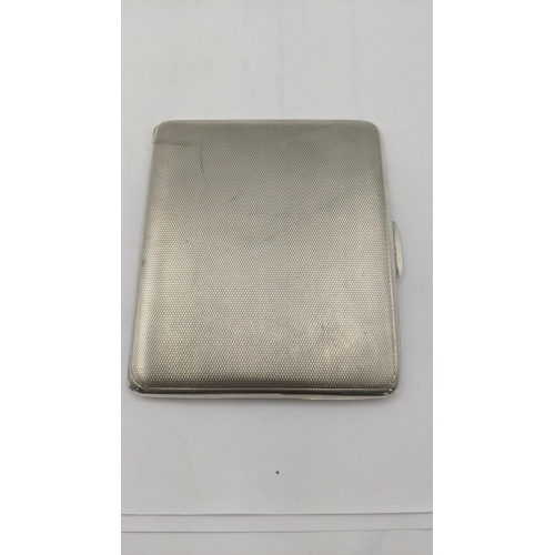 206 - A silver cigarette case having engine turned decoration and gilt interior Birmingham 1940, 121.2g Lo... 