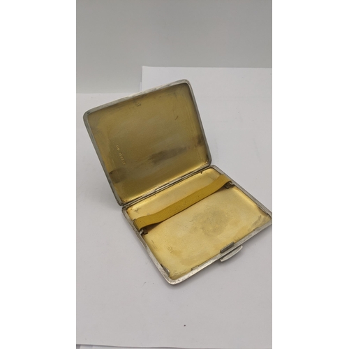 206 - A silver cigarette case having engine turned decoration and gilt interior Birmingham 1940, 121.2g Lo... 