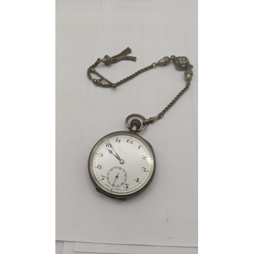 207 - An early 20th century silver Swiss open faced keyless pocket watch on an Alberni watch chain Locatio... 