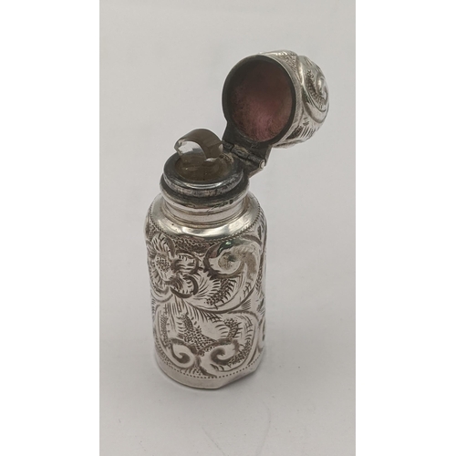 209 - A Charles May Victorian silver perfume bottle with floral embossed decoration Location: C5
If there ... 