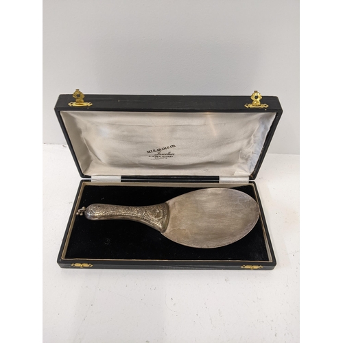 390 - An Indian silver rice scoop with embroidered handle, in a case weighing 64.6g
Location:ST
If there i... 