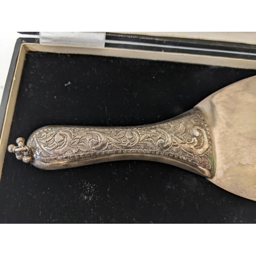 390 - An Indian silver rice scoop with embroidered handle, in a case weighing 64.6g
Location:ST
If there i... 