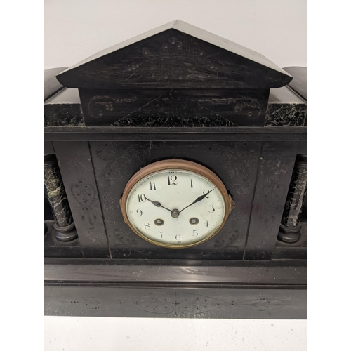 459 - A Victorian slate mantel clock with architectural design, with an Arabic dial
Location: LAB
If there... 