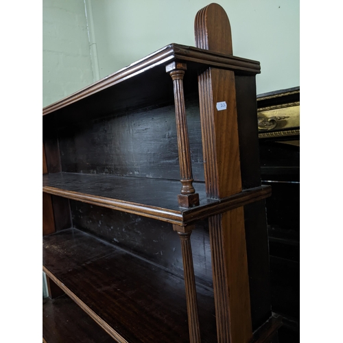 471 - 19th century mahogany Regency open bookcase, four shelves supported on reeded open columns, splayed ... 