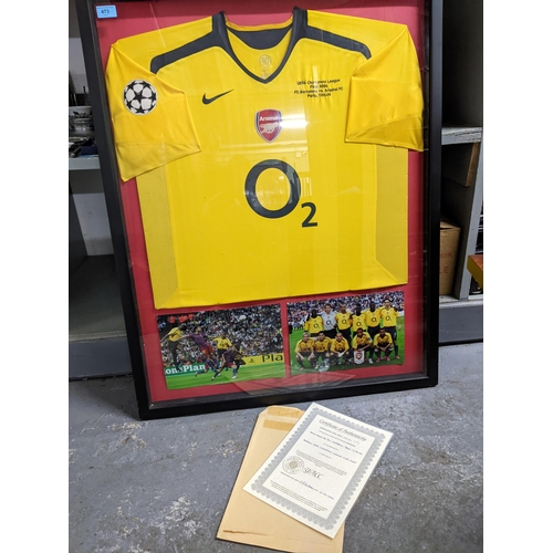 473 - A framed and glazed UEFA Champions League Final 2006 Sol Campbell of Arsenal FC shirt, with Misbourn... 