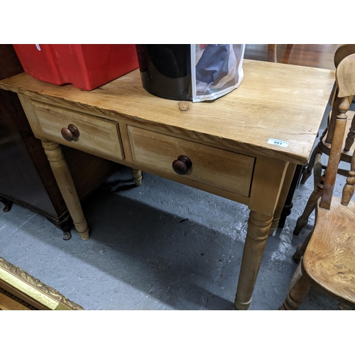 481 - A Victorian pine two drawer side table on turned legs, 77cm x 50cm, along with four kitchen chains w... 