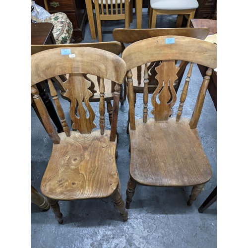 481 - A Victorian pine two drawer side table on turned legs, 77cm x 50cm, along with four kitchen chains w... 