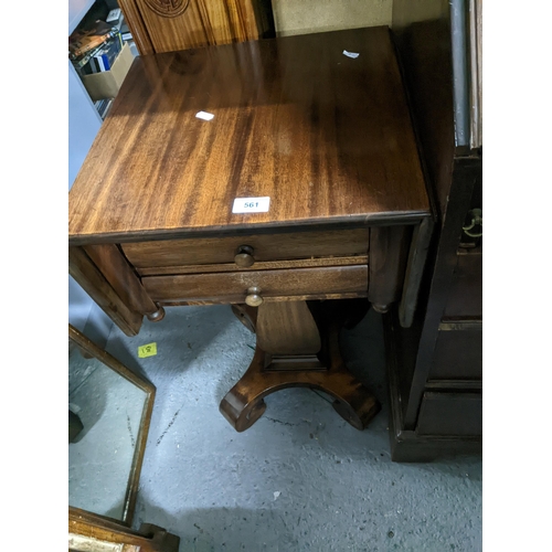 561 - A 19th century mahogany work table with two drawers and drop side table flaps on scrolled feet 70cm ... 