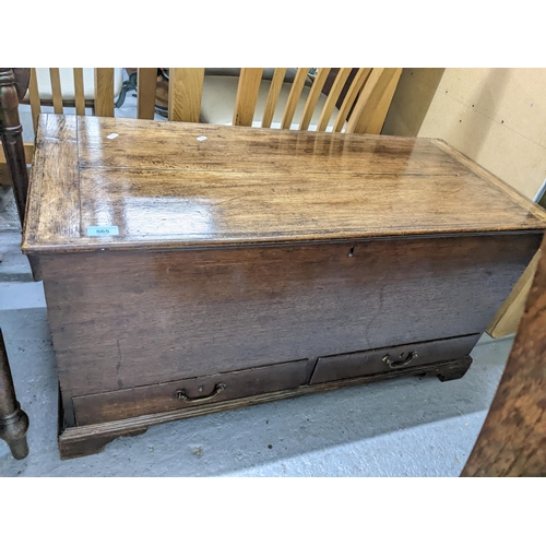 565 - A 19th century oak chest with hinged top over two drawers on bracket feet 49cm h x 98cm w Location: ... 