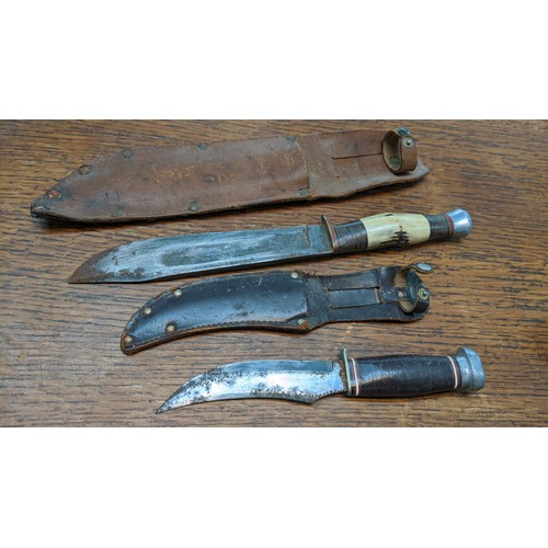 221 - A William Rodgers sheath knife and other larger example
Location: 6-3
If there is no condition repor... 