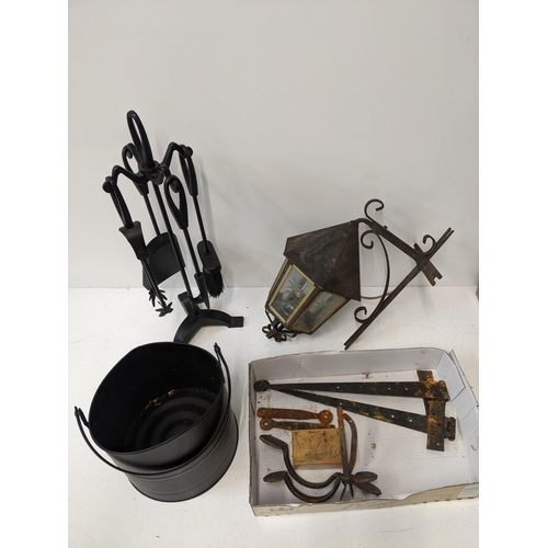 455 - Metalware to include fire irons, a coal skuttle, door furniture and a lamp
Location: GM
If there is ... 