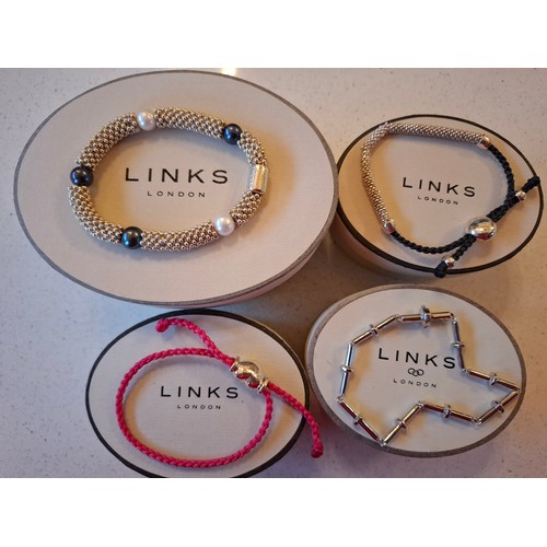 30 - Links of London- 4 bracelets with silver clasps and branded boxes. Location:A4M
If there is no condi... 