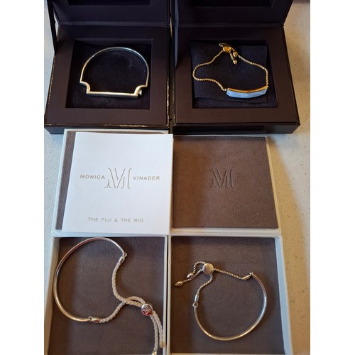 48 - Monica Vinader- 4 bracelets to include a 'Signature Skinny' stirrup style silver bangle with branded... 