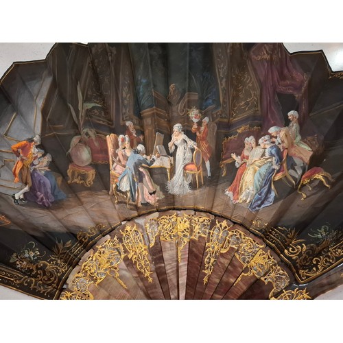 50 - Two fans to include a late 19th/early 20th Century hand painted fan A/F having 2 guards and 14 wands... 