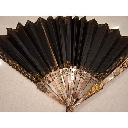 50 - Two fans to include a late 19th/early 20th Century hand painted fan A/F having 2 guards and 14 wands... 