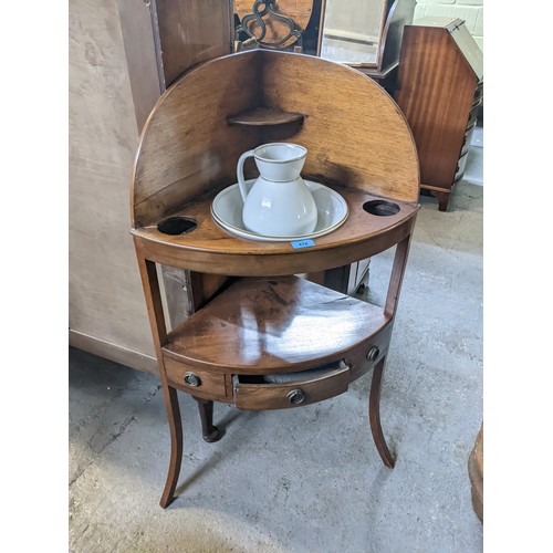 478 - A late Georgian/early Victorian mahogany corner wash stand with a Victorian white glazed wash jug an... 