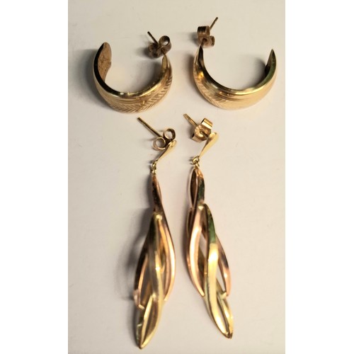 57 - Two pairs of 9ct gold earrings, weight 2g. Location:Cab3
If there is no condition report, please req... 