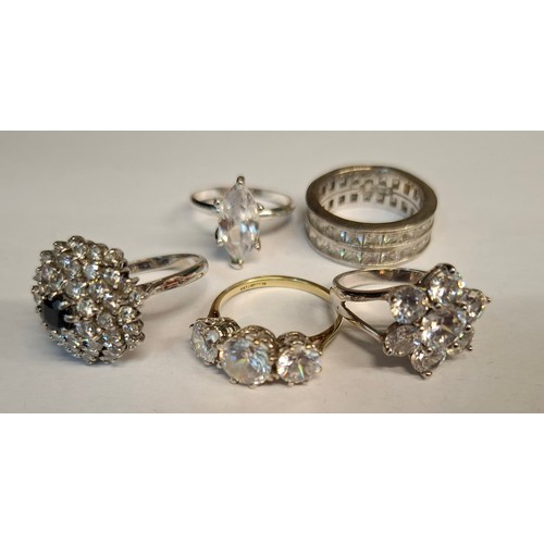 56 - A group of 7 modern dress rings to include a 9ct gold and 3 large white paste stone ring, total weig... 