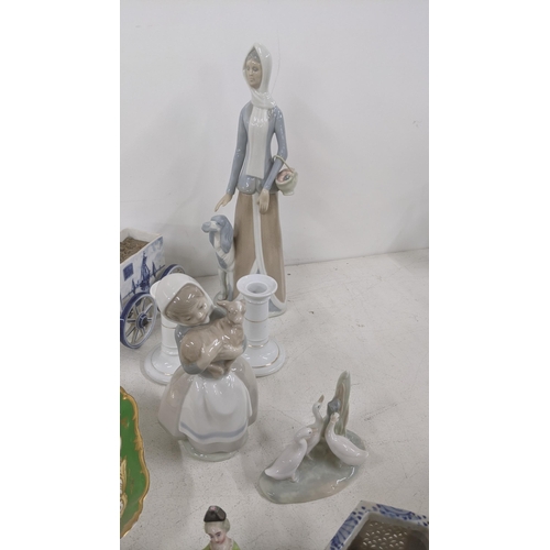 22 - A mixed lot of ceramics and collectables to include Lladro Nao 'Girl with Lamb' and a Lladro Tengra ... 