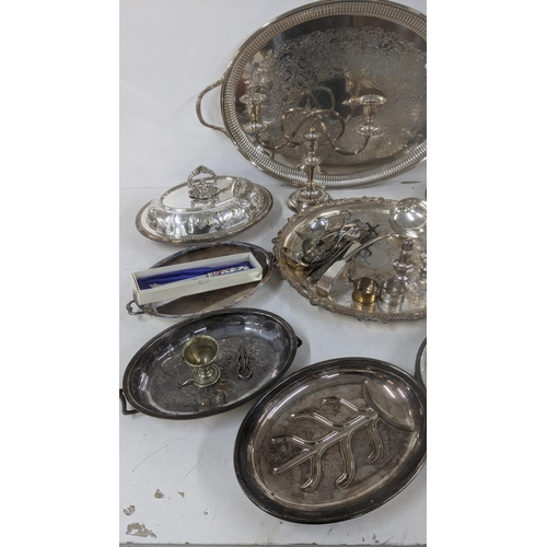 25 - A selection of silver plated and other tableware to include oval entrée dishes, a pedestal dish, twi... 