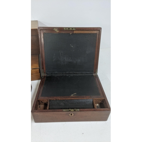 30 - A collection of 19th century and later wooden jewellery boxes and others together with a writing slo... 