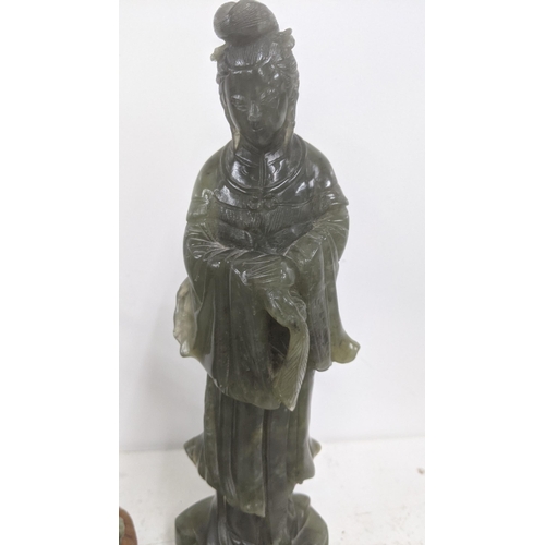 34 - Two jade sculptures to include Chinese geisha figure 24cm H together with one other example on a woo... 