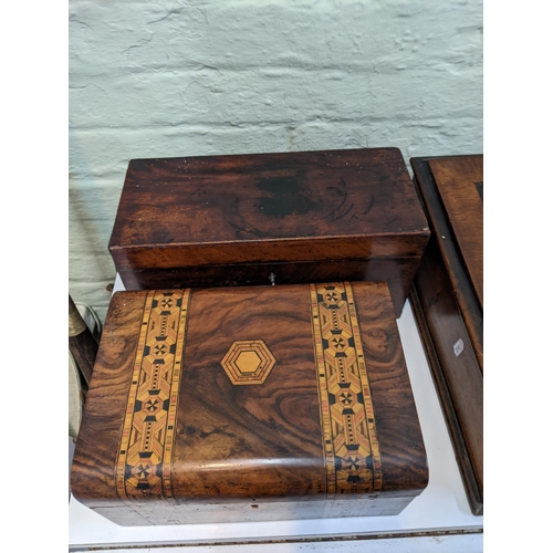 37 - A group of four vintage boxes to include a mahogany tea caddy with mother of pearl inlay, a walnut t... 