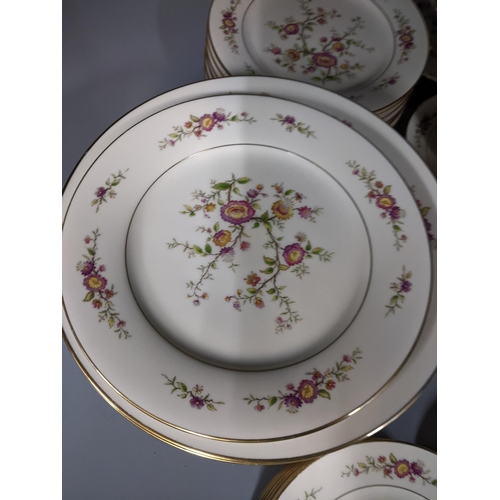 44 - A Noritake 'Asian Song' pattern part dinner service to include plates, side plates teacups and sauce... 