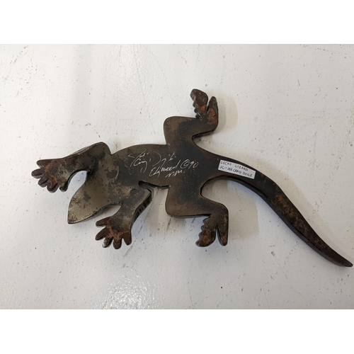 54 - Joe Craig Doyle - a metal model of a lizard
Location: 1.3
If there is no condition report shown, ple... 