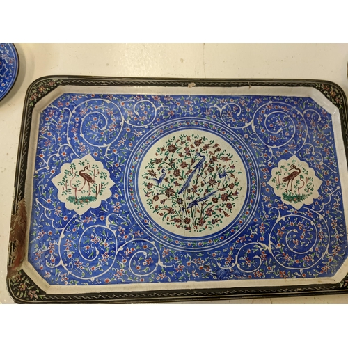 57 - An Islamic blue, white and red enamelled miniature tea set, matchbox holder and dish
Location: 1.3
I... 