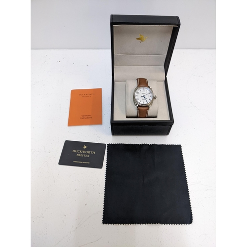 65 - A Duckworth Prestex Bolton Verimatic gents wristwatch, in original case with manual and guarantee ca... 