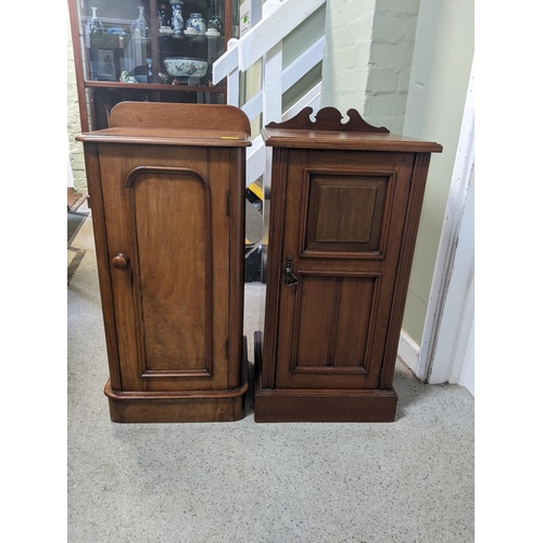 67 - A late Victorian walnut bedside cabinet with a panelled door and similar Edwardian example
Location:... 