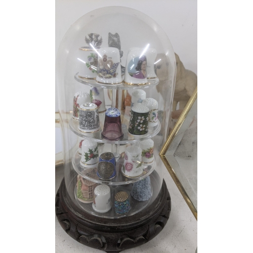 7 - A mixed lot to include a collection of thimbles, Wedgwood Jasperware and others housed in display ca... 