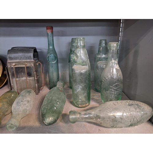 82 - A collection of glass torpedo and other bottles, mainly from the Midlands and the Cotswolds, also to... 