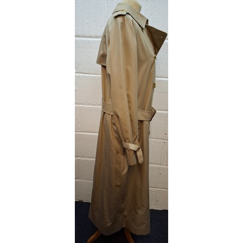 8 - Burberrys- A late 20th Century ladies beige Kensington trench coat with bone effect buttons, double ... 