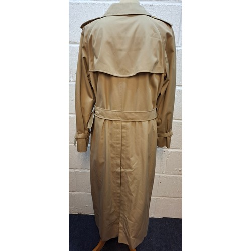 8 - Burberrys- A late 20th Century ladies beige Kensington trench coat with bone effect buttons, double ... 