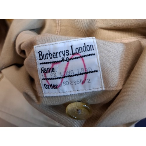 8 - Burberrys- A late 20th Century ladies beige Kensington trench coat with bone effect buttons, double ... 