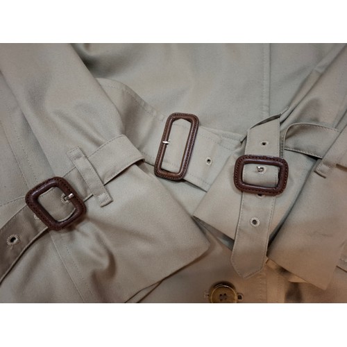 8 - Burberrys- A late 20th Century ladies beige Kensington trench coat with bone effect buttons, double ... 