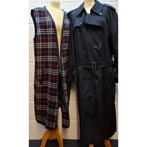 9 - Burberrys- A late 20th Century gents navy Kensington trench coat with navy buttons, double breasted,... 